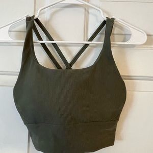 Army Green Sports Bra. Not sure of exact size but should be Large/XL.